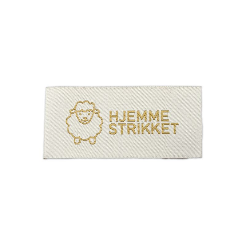 Symerke Hjemmestrikket hvit/gull
